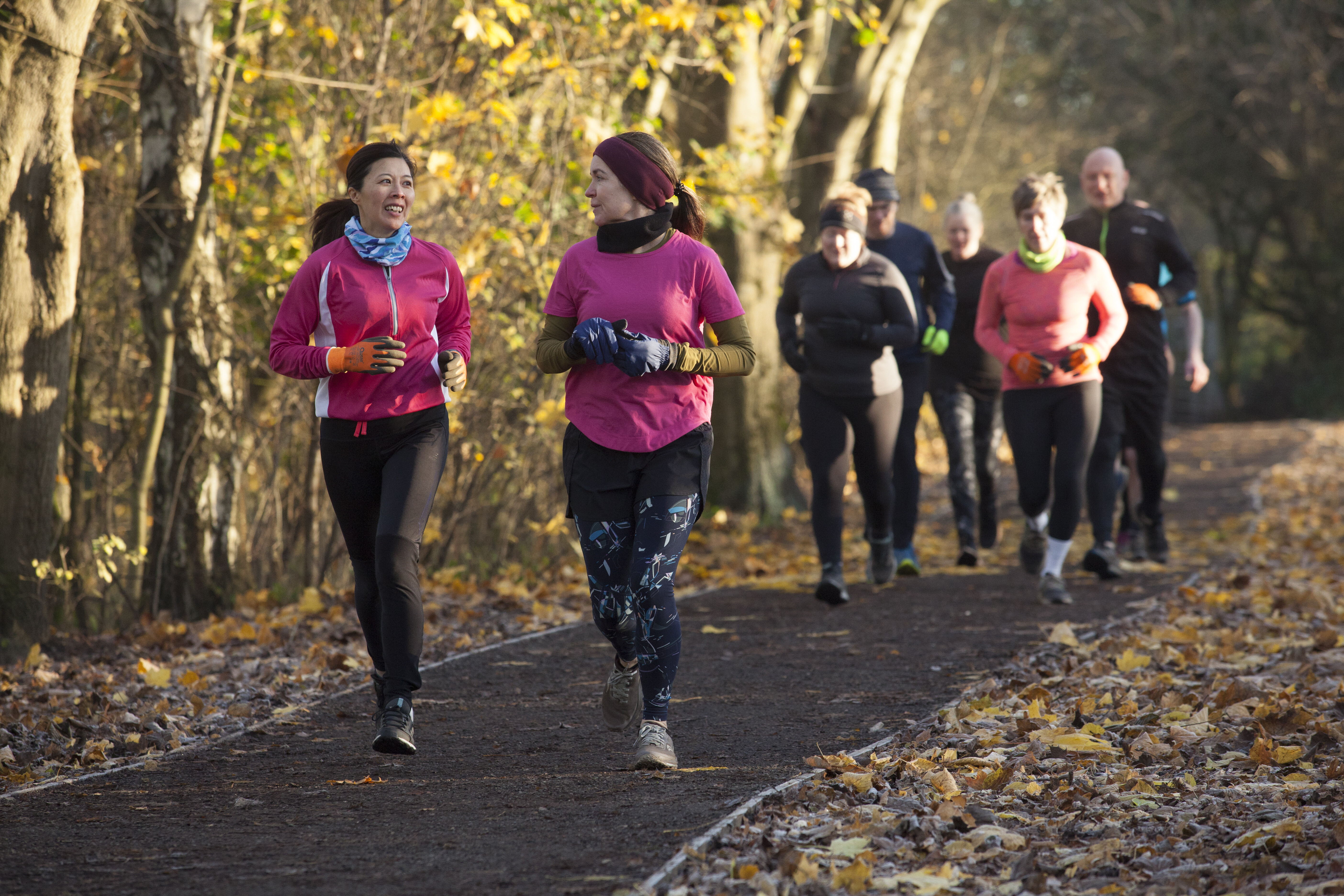 Group of adults jogging together
